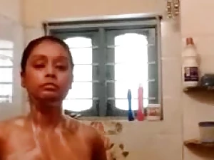 Indian unshaded takes a bathroom on the top of webcam